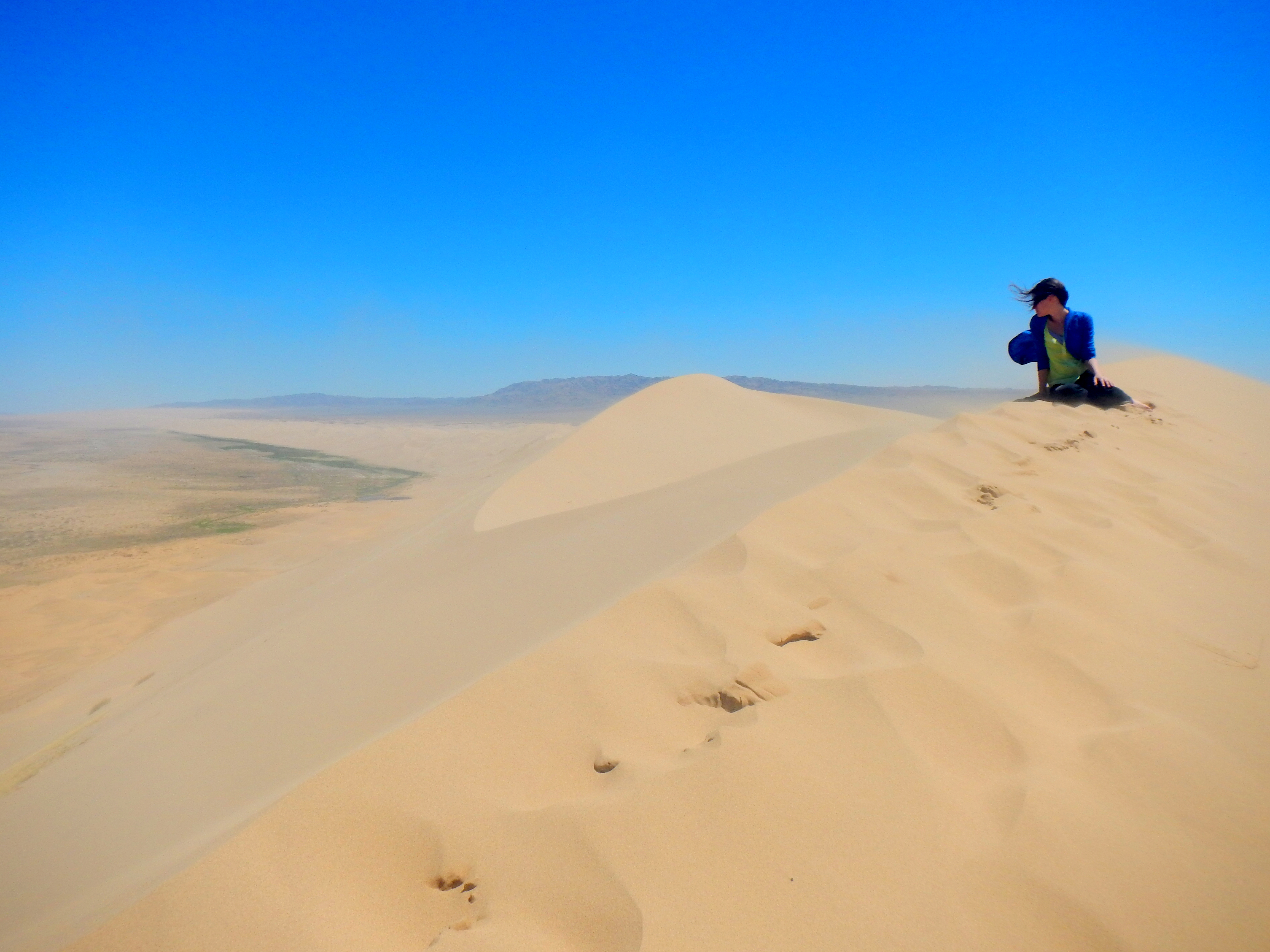 At the top of the dunes in Khongoriin Els, Gobi Desert, Mongolia
