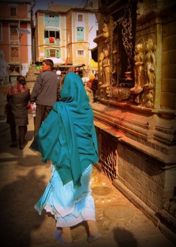 In the streets of Kathmandu, Nepal, a local in her beautiful sari