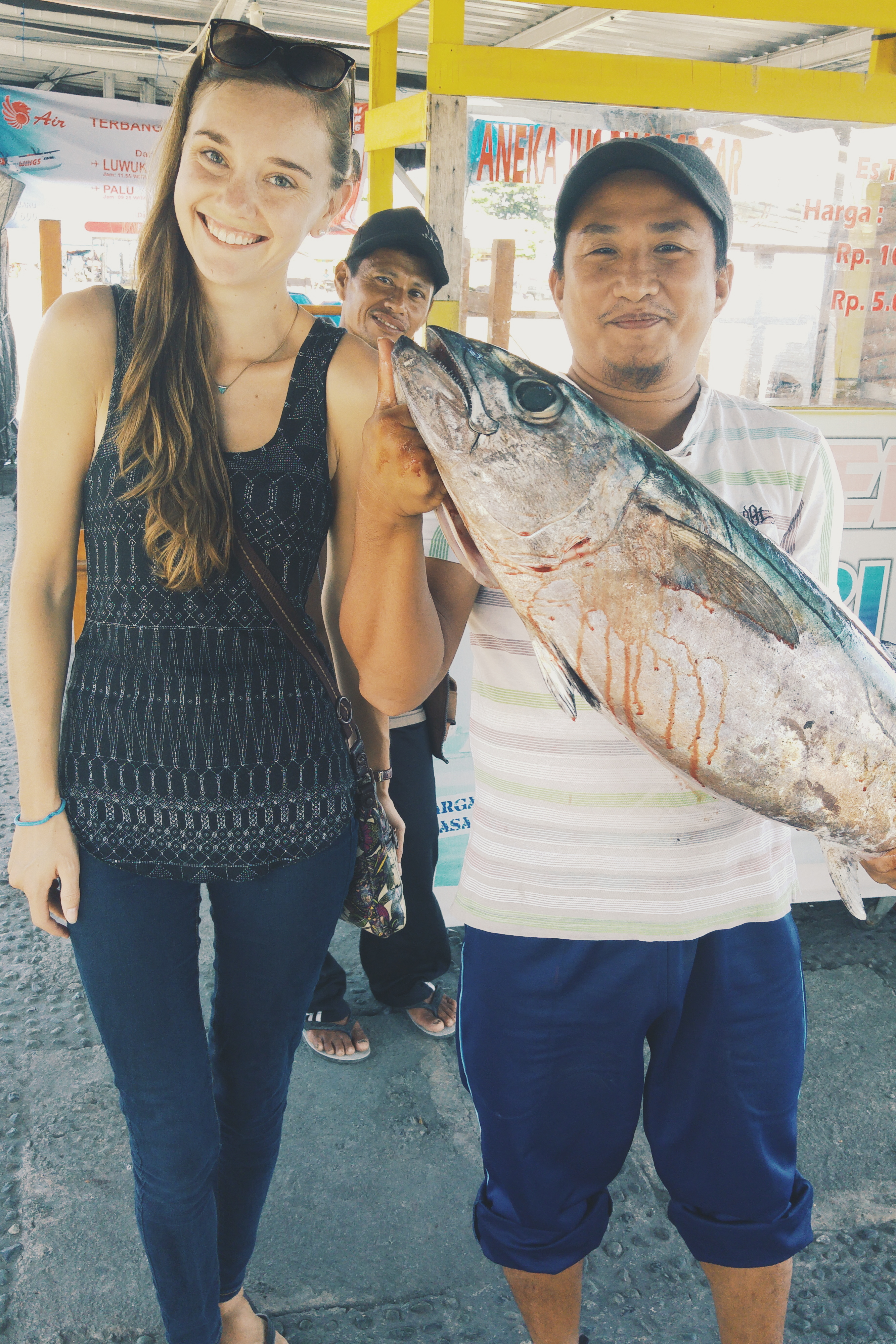 Indonesia, Ampana- he thought I'd like to have a photo with his big bloody fish. Ah, how well he knows me.