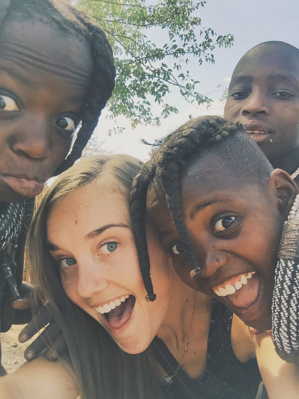 Opuwa, Namibia - Himba tribe. No matter where they're from, kids love to take goofy selfies.